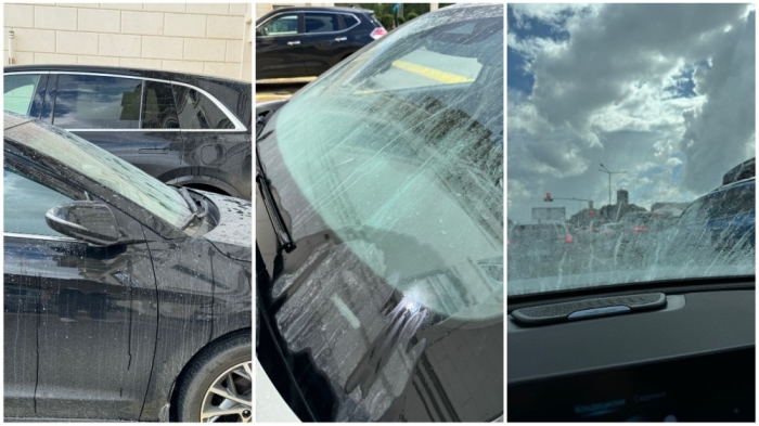 Здание элитного отеля испортило припаркованные авто в Астане